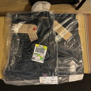Levi’s 527 bootcut 31 x 34 2 pairs Brand New in plastic Indigo Black
